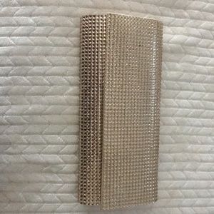 Gold sparkly hand bag